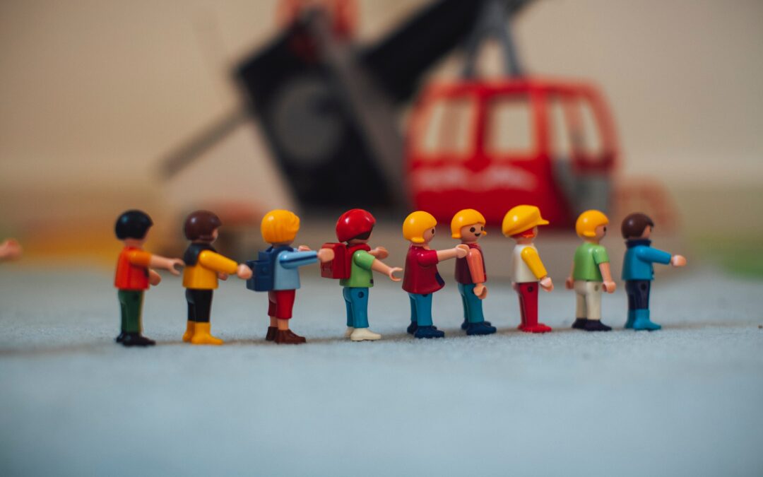 Playmobil men in a line